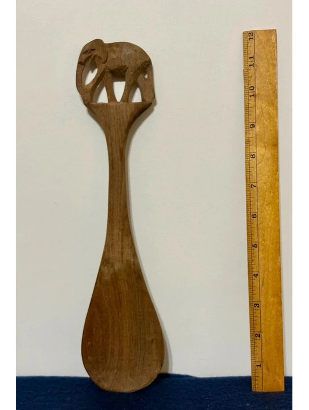 vintage hand-carved wooden serving spoon, carved elephant handle